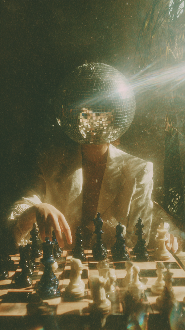 u8997694439_overhead_shot_of_a_woman_with_a_big_mirrored_disc_56d75a6c-7df0-453f-9379-484fe392c5e8_2 (1)-1